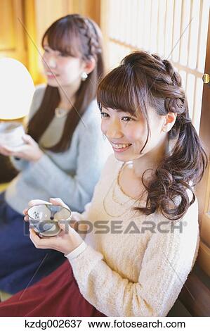 Young Japanese women enjoying Maccha green tea in Kawagoe, Japan View Large Photo Image Stock Photo - Young Japanese women enjoying Maccha green tea in Kawagoe, Japan. Fotosearch