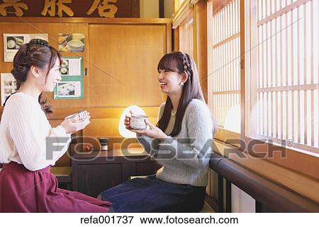 Young Japanese women enjoying Maccha green tea in Kawagoe, Japan View Large Photo Image Stock Photo - Young Japanese women enjoying Maccha green tea in Kawagoe, Japan. Fotosearch