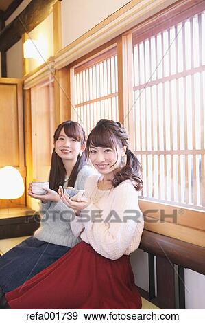 Young Japanese women enjoying Maccha green tea in Kawagoe, Japan View Large Photo Image Stock Photo - Young Japanese women enjoying Maccha green tea in Kawagoe, Japan. Fotosearch