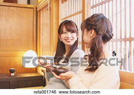 Young Japanese women enjoying Maccha green tea in Kawagoe, Japan View Large Photo Image Stock Photograph - Young Japanese women enjoying Maccha green tea in Kawagoe, Japan. Fotosearch
