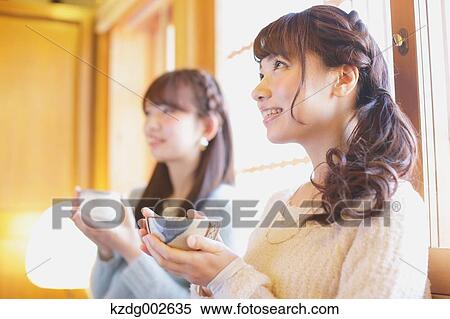 Young Japanese women enjoying Maccha green tea in Kawagoe, Japan View Large Photo Image Stock Photography - Young Japanese women enjoying Maccha green tea in Kawagoe, Japan. Fotosearch