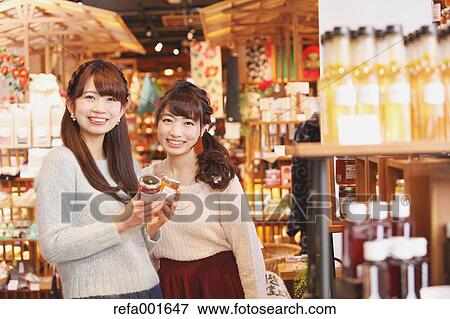 Young Japanese women enjoying shopping in Kawagoe, Japan View Large Photo Image Stock Photo - Young Japanese women enjoying shopping in Kawagoe, Japan. Fotosearch