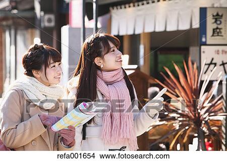 Young Japanese women enjoying trip in Kawagoe, Japan View Large Photo Image Picture - Young Japanese women enjoying trip in Kawagoe, Japan. Fotosearch