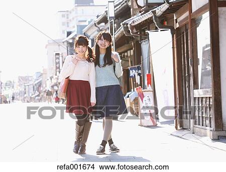 Picture - Young Japanese women enjoying trip in Kawagoe, Japan. Fotosearch