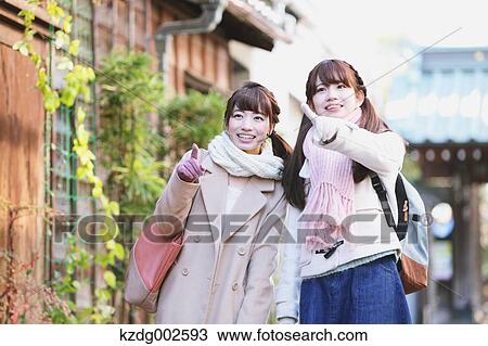 Young Japanese women enjoying trip in Kawagoe, Japan View Large Photo Image Stock Image - Young Japanese women enjoying trip in Kawagoe, Japan. Fotosearch
