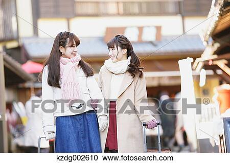Young Japanese women enjoying trip in Kawagoe, Japan View Large Photo Image Stock Image - Young Japanese women enjoying trip in Kawagoe, Japan. Fotosearch
