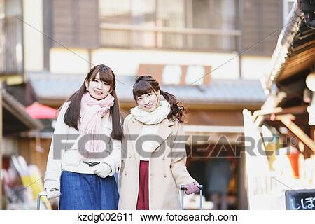 Young Japanese women enjoying trip in Kawagoe, Japan View Large Photo Image Stock Image - Young Japanese women enjoying trip in Kawagoe, Japan. Fotosearch