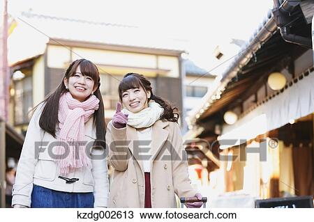 Young Japanese women enjoying trip in Kawagoe, Japan View Large Photo Image Stock Image - Young Japanese women enjoying trip in Kawagoe, Japan. Fotosearch