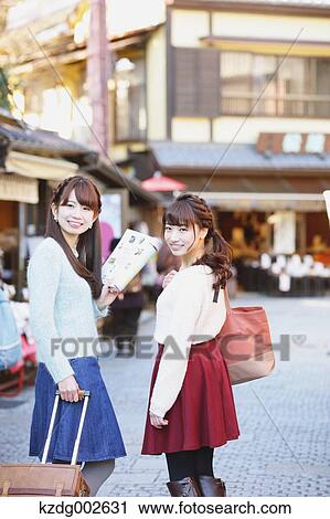 Young Japanese women enjoying trip in Kawagoe, Japan View Large Photo Image Stock Image - Young Japanese women enjoying trip in Kawagoe, Japan. Fotosearch