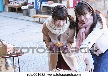 Young Japanese women enjoying trip in Kawagoe, Japan View Large Photo Image Stock Image - Young Japanese women enjoying trip in Kawagoe, Japan. Fotosearch