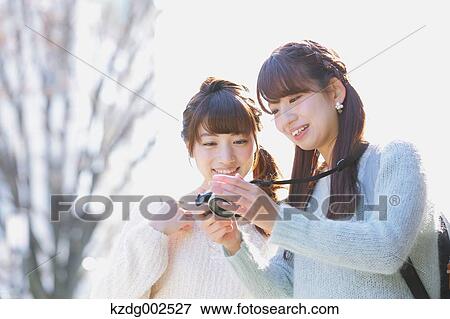 Young Japanese women enjoying trip in Kawagoe, Japan View Large Photo Image Stock Photo - Young Japanese women enjoying trip in Kawagoe, Japan. Fotosearch