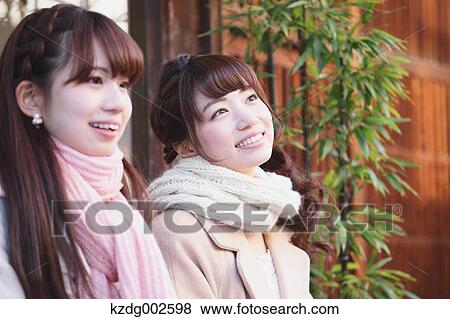 Stock Photo - Young Japanese women enjoying trip in Kawagoe, Japan. Fotosearch
