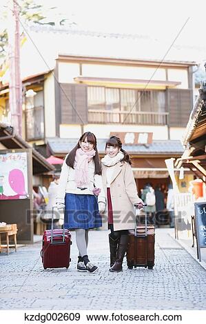 Young Japanese women enjoying trip in Kawagoe, Japan View Large Photo Image Stock Photo - Young Japanese women enjoying trip in Kawagoe, Japan. Fotosearch