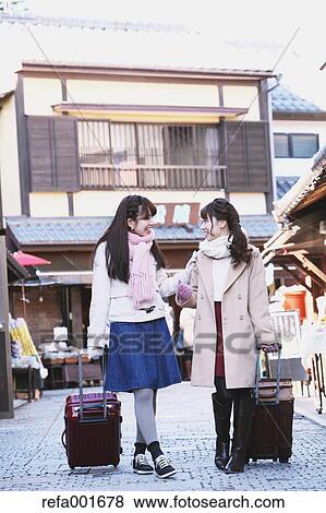 Young Japanese women enjoying trip in Kawagoe, Japan View Large Photo Image Stock Photo - Young Japanese women enjoying trip in Kawagoe, Japan. Fotosearch
