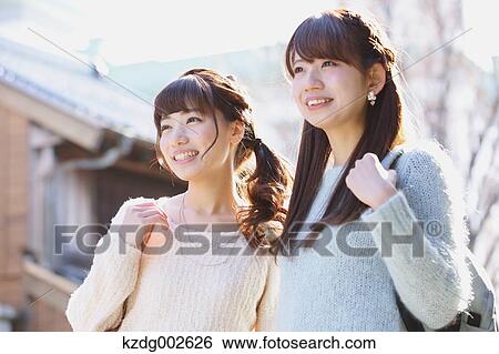 Young Japanese women enjoying trip in Kawagoe, Japan View Large Photo Image Stock Photograph - Young Japanese women enjoying trip in Kawagoe, Japan. Fotosearch
