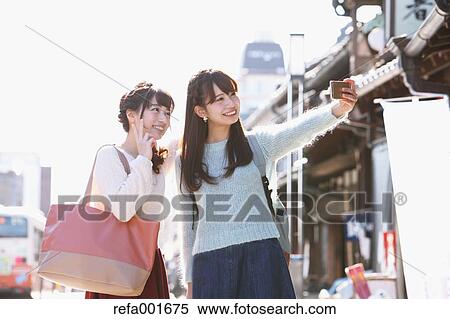 Young Japanese women enjoying trip in Kawagoe, Japan View Large Photo Image Stock Photography - Young Japanese women enjoying trip in Kawagoe, Japan. Fotosearch