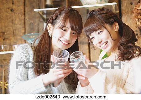 Young Japanese women enjoying visit to glass workshop in Kawagoe, Japan View Large Photo Image Stock Image - Young Japanese women enjoying visit to glass workshop in Kawagoe, Japan. Fotosearch