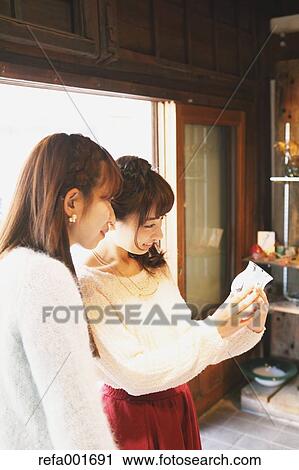 Young Japanese women enjoying visit to glass workshop in Kawagoe, Japan View Large Photo Image Stock Image - Young Japanese women enjoying visit to glass workshop in Kawagoe, Japan. Fotosearch