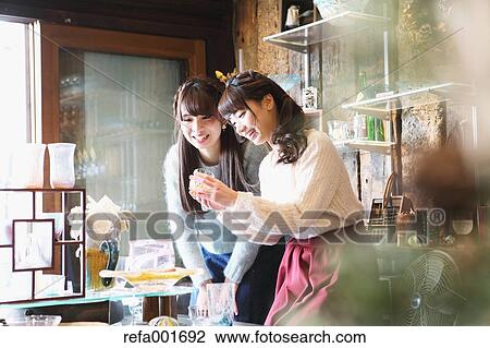 Young Japanese women enjoying visit to glass workshop in Kawagoe, Japan View Large Photo Image Stock Image - Young Japanese women enjoying visit to glass workshop in Kawagoe, Japan. Fotosearch