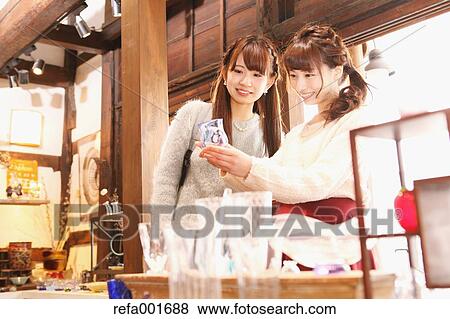 Young Japanese women enjoying visit to glass workshop in Kawagoe, Japan View Large Photo Image Stock Photo - Young Japanese women enjoying visit to glass workshop in Kawagoe, Japan. Fotosearch