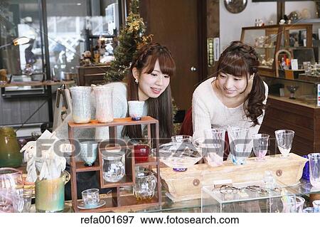 Young Japanese women enjoying visit to glass workshop in Kawagoe, Japan View Large Photo Image Stock Photo - Young Japanese women enjoying visit to glass workshop in Kawagoe, Japan. Fotosearch