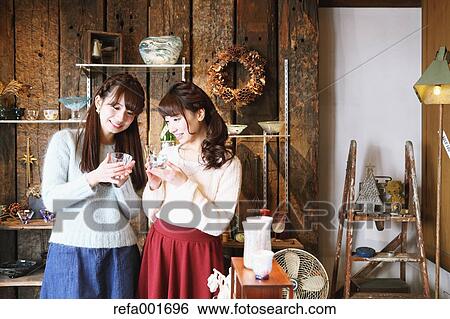 Young Japanese women enjoying visit to glass workshop in Kawagoe, Japan View Large Photo Image Stock Photograph - Young Japanese women enjoying visit to glass workshop in Kawagoe, Japan. Fotosearch