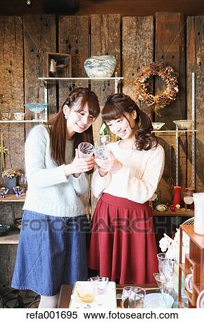 Young Japanese women enjoying visit to glass workshop in Kawagoe, Japan View Large Photo Image Stock Photography - Young Japanese women enjoying visit to glass workshop in Kawagoe, Japan. Fotosearch