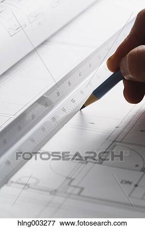 Stock Photo - Architect working in his studio. Fotosearch
