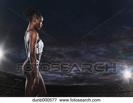 Stock Photo - Athlete preparing to run. Fotosearch
