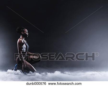 Athlete preparing to run View Large Photo Image Stock Photograph - Athlete preparing to run. Fotosearch