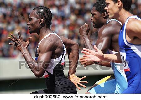 Stock Image - Athletes running on running track. Fotosearch