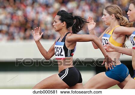 Athletes running on running track View Large Photo Image Stock Image - Athletes running on running track. Fotosearch