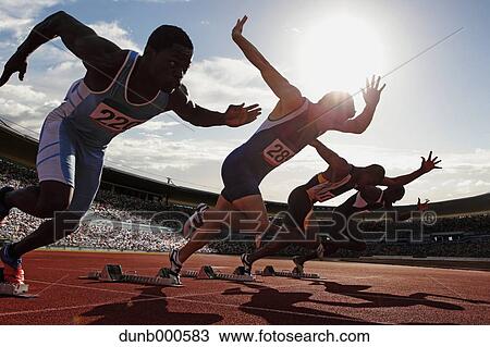 Athletes running on running track View Large Photo Image Stock Image - Athletes running on running track. Fotosearch