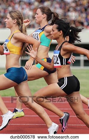 Stock Photo - Athletes running on running track. Fotosearch