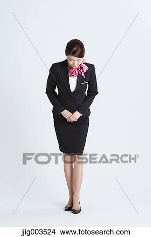 Attractive Japanese concierge View Large Photo Image Picture - Attractive Japanese concierge. Fotosearch