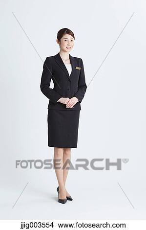 Picture - Attractive Japanese concierge. Fotosearch