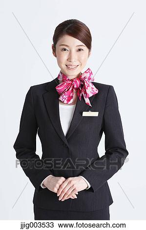 Stock Image - Attractive Japanese concierge. Fotosearch