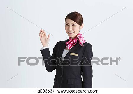 Attractive Japanese concierge View Large Photo Image Stock Photo - Attractive Japanese concierge. Fotosearch