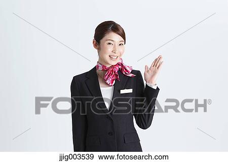 Stock Photo - Attractive Japanese concierge. Fotosearch