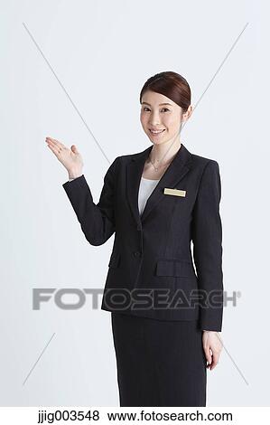 Attractive Japanese concierge View Large Photo Image Stock Photo - Attractive Japanese concierge. Fotosearch