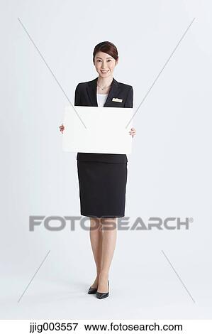 Attractive Japanese concierge View Large Photo Image Stock Photo - Attractive Japanese concierge. Fotosearch