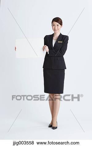 Attractive Japanese concierge View Large Photo Image Stock Photo - Attractive Japanese concierge. Fotosearch