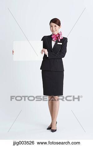 Stock Photograph - Attractive Japanese concierge. Fotosearch