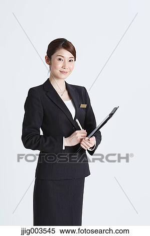 Attractive Japanese concierge View Large Photo Image Stock Photography - Attractive Japanese concierge. Fotosearch