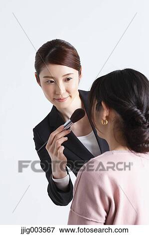 Attractive Japanese make-up artist View Large Photo Image Stock Photo - Attractive Japanese make-up artist. Fotosearch