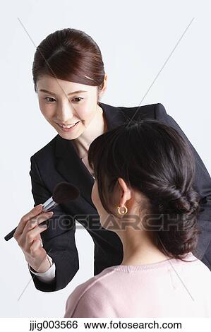 Attractive Japanese make-up artist View Large Photo Image Stock Photograph - Attractive Japanese make-up artist. Fotosearch