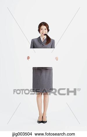 Attractive Japanese office worker View Large Photo Image Picture - Attractive Japanese office worker. Fotosearch