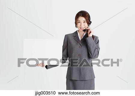 Attractive Japanese office worker View Large Photo Image Stock Image - Attractive Japanese office worker. Fotosearch