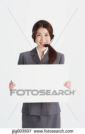 Attractive Japanese office worker View Large Photo Image Stock Photo - Attractive Japanese office worker. Fotosearch