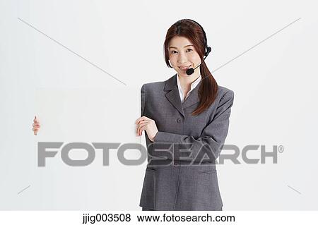 Attractive Japanese office worker View Large Photo Image Stock Photo - Attractive Japanese office worker. Fotosearch